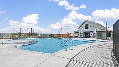 large swimming pool next to the amenity center