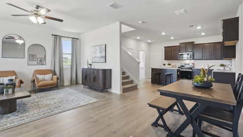 living area and dining room furnished