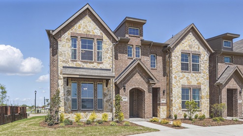 townhome with brick exterior