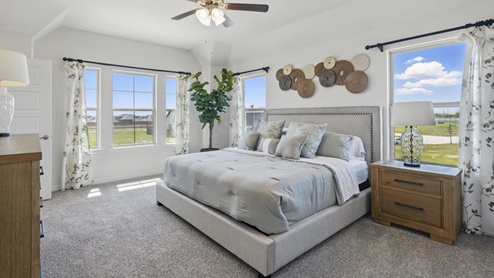 a furnished primary bedroom