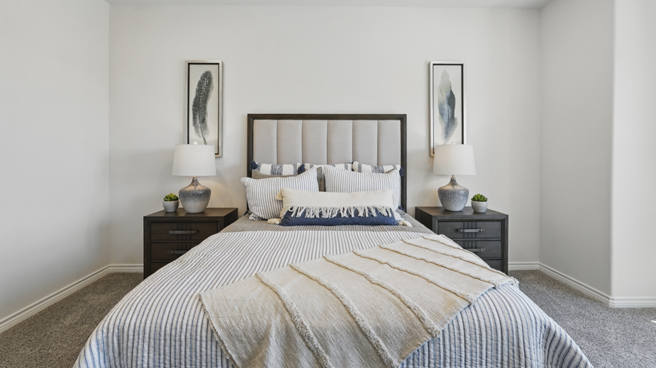 primary bedroom with large windows providing natural light to the entire room