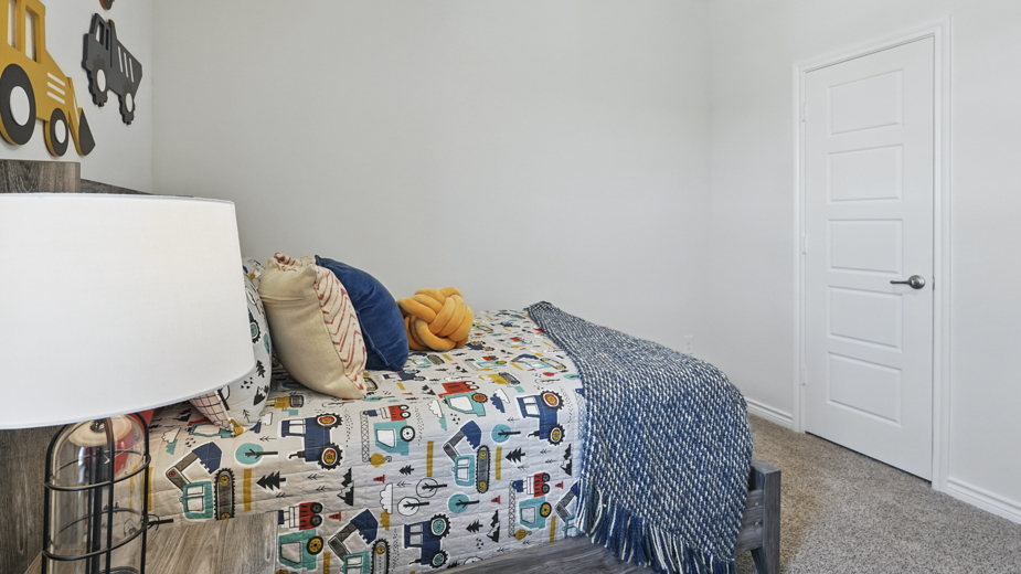 secondary bedroom with carpet and natural light coming from large window