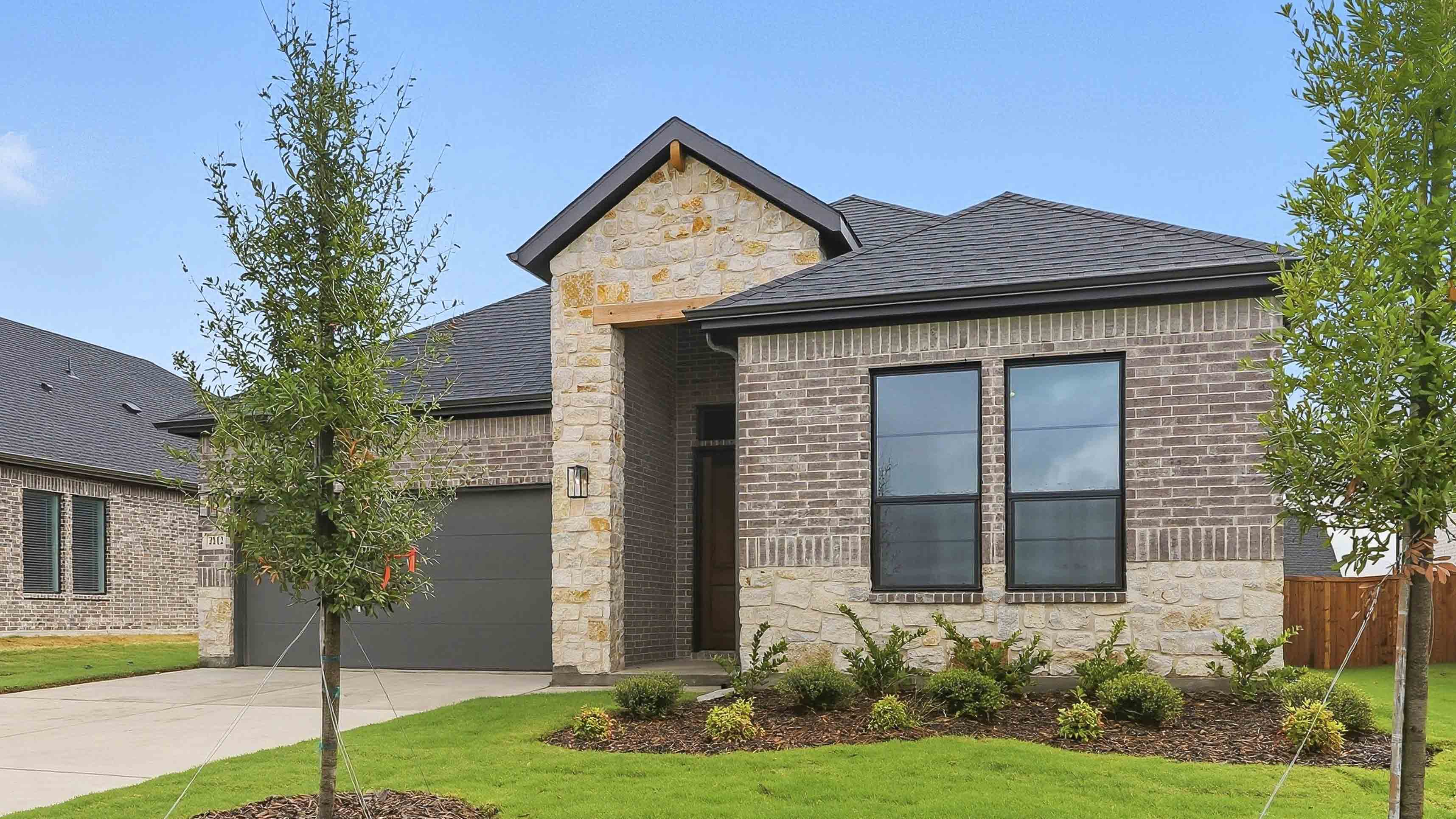 one story home with two car garage