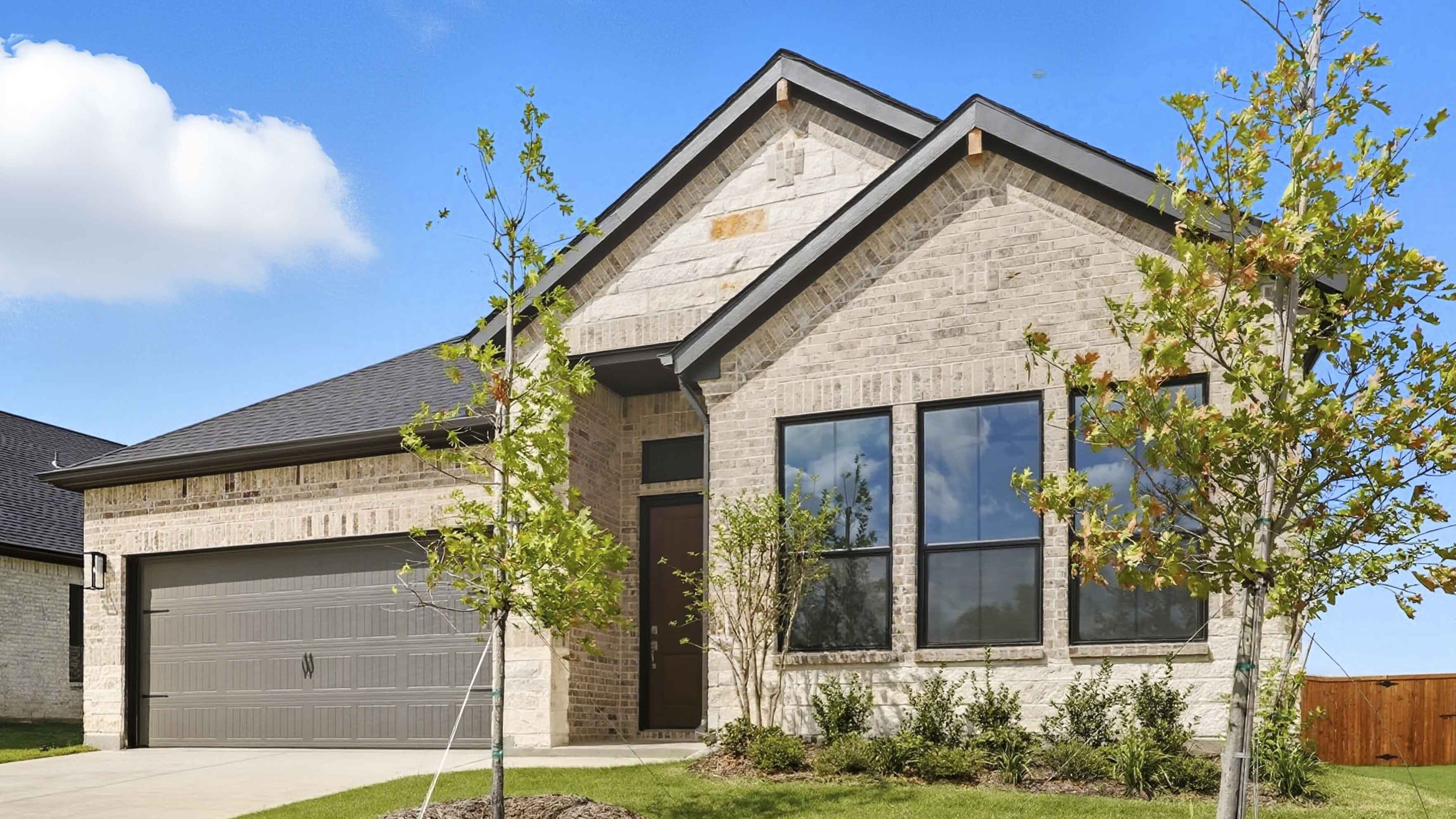 one story home with two car garage