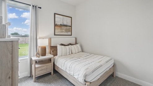 Interior bedroom with large window