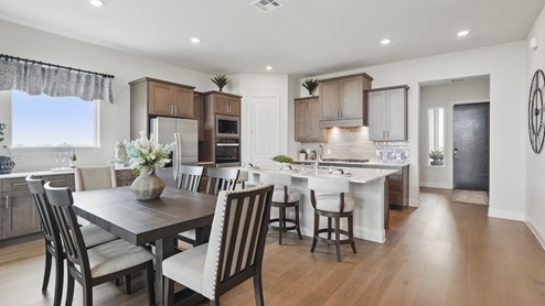 Interior dining area looking over into the kitchen