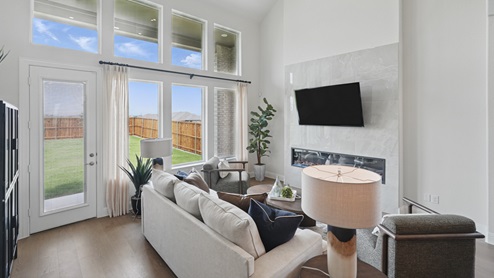Interior living room with windows and built in fire place