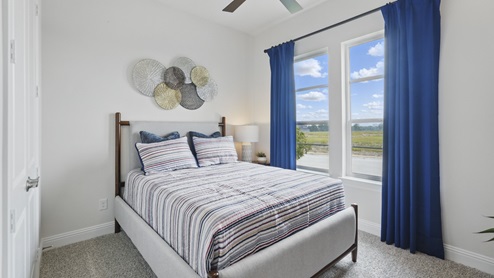 Interior bedroom with large window