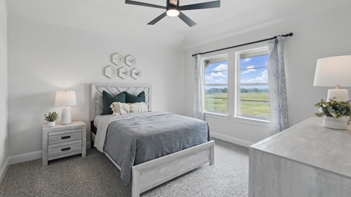 Interior bedroom with large window