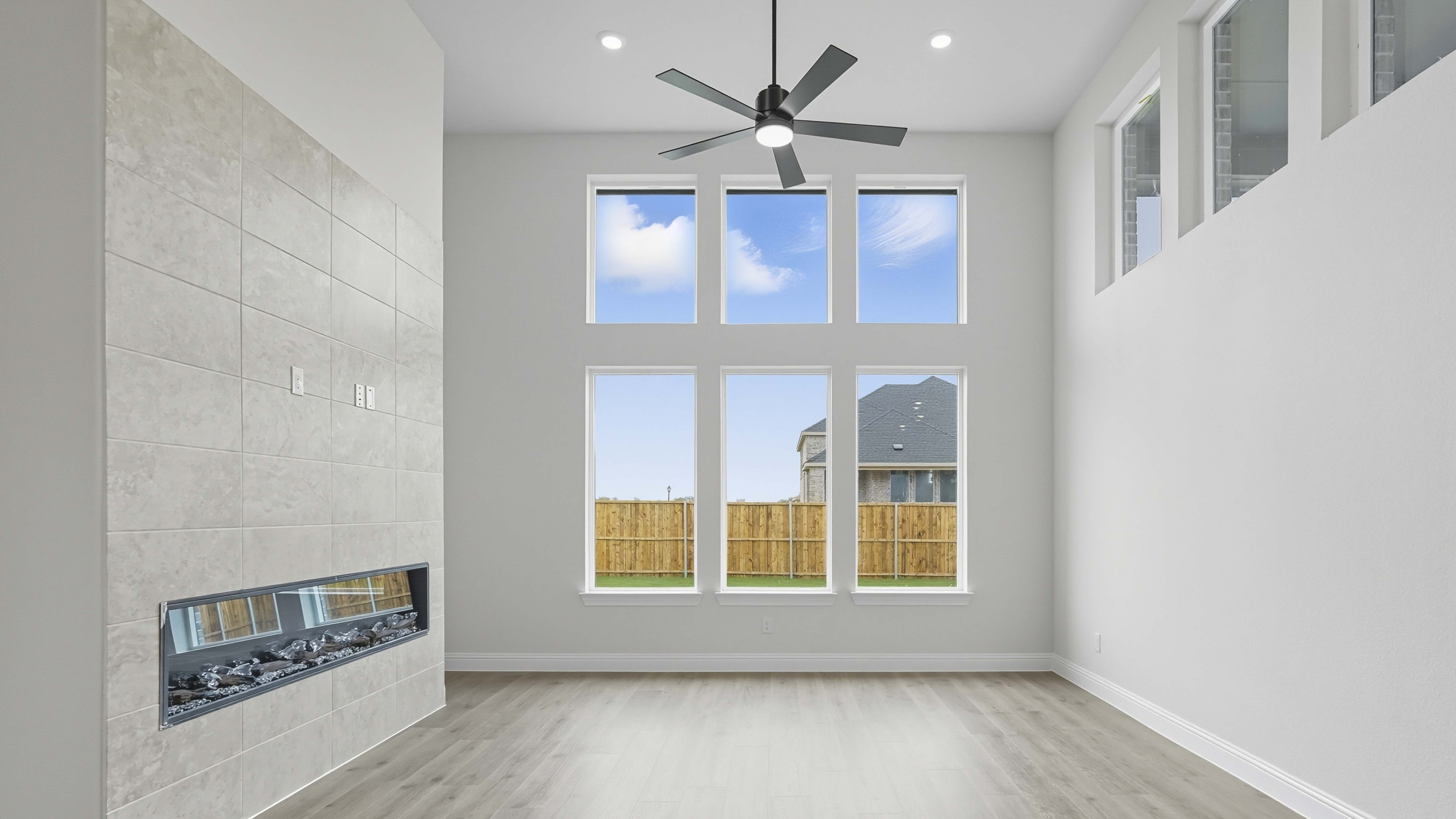 open concept living area with large windows