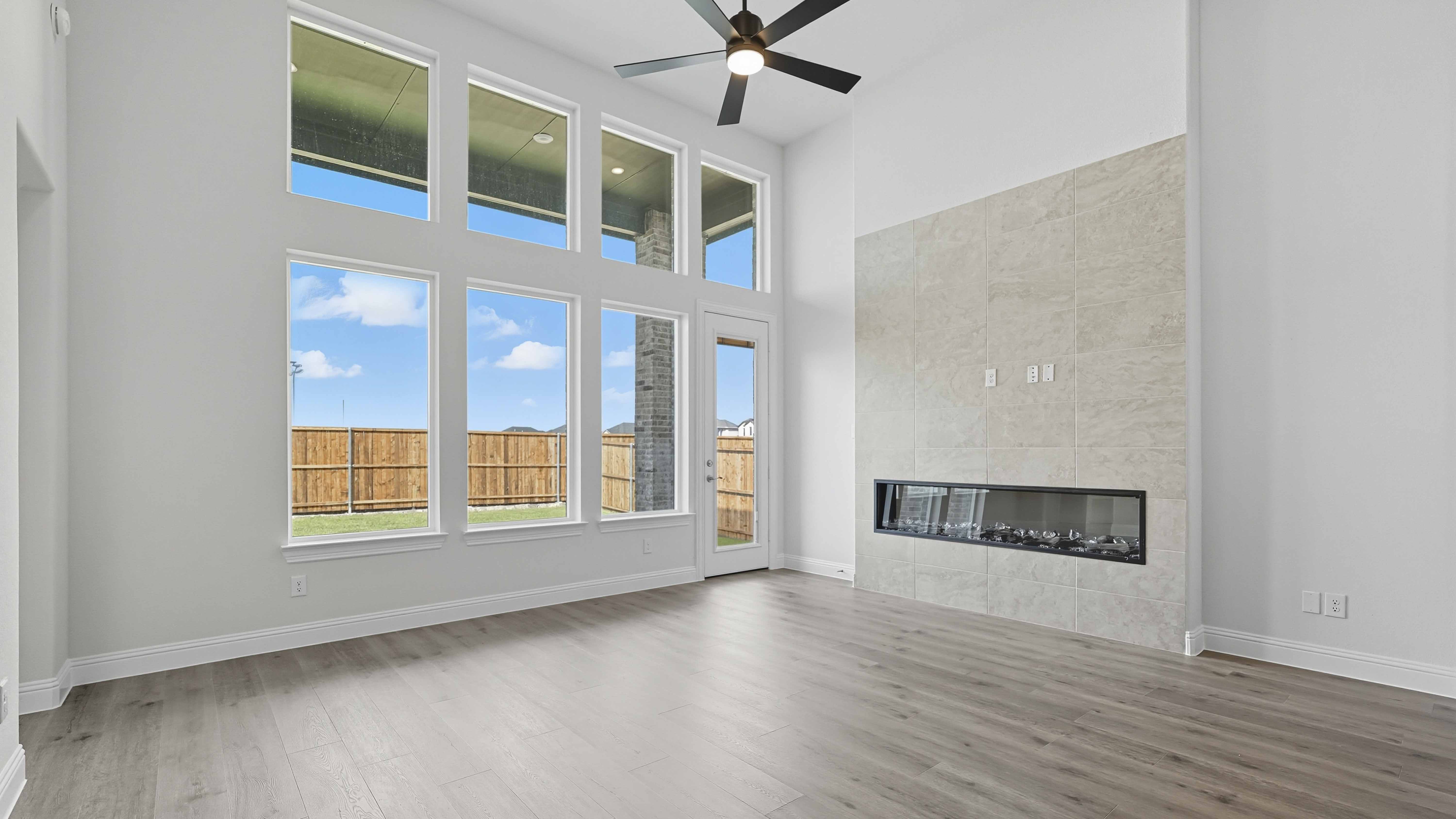 open concept living area with large windows