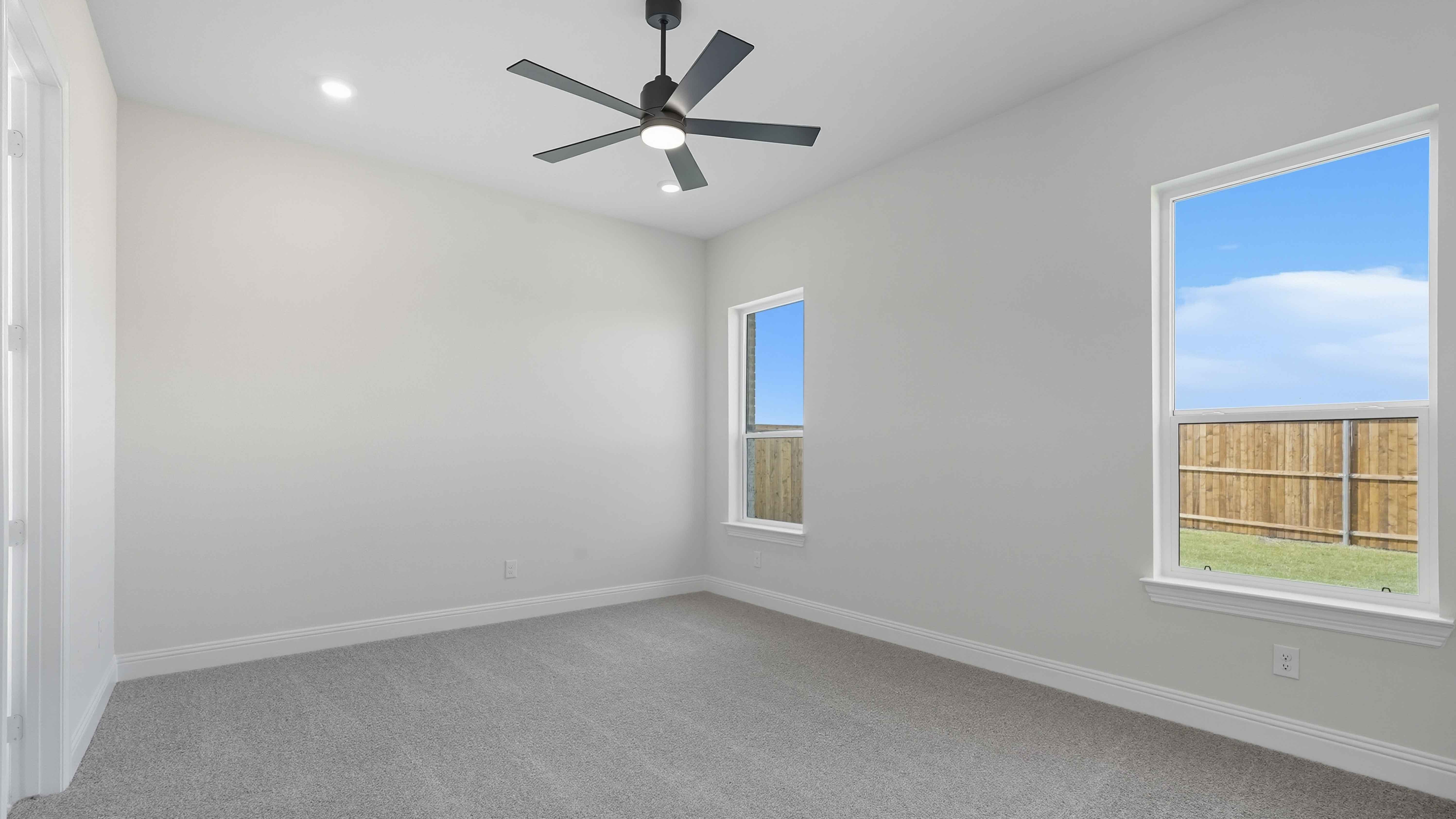 primary bedroom with natural light