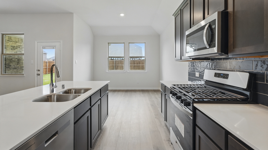 Kitchen with stainless steel appliances.