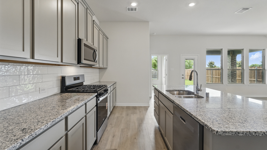 Kitchen area in the open concept layout