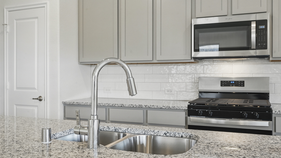 Kitchen area in the open concept layout