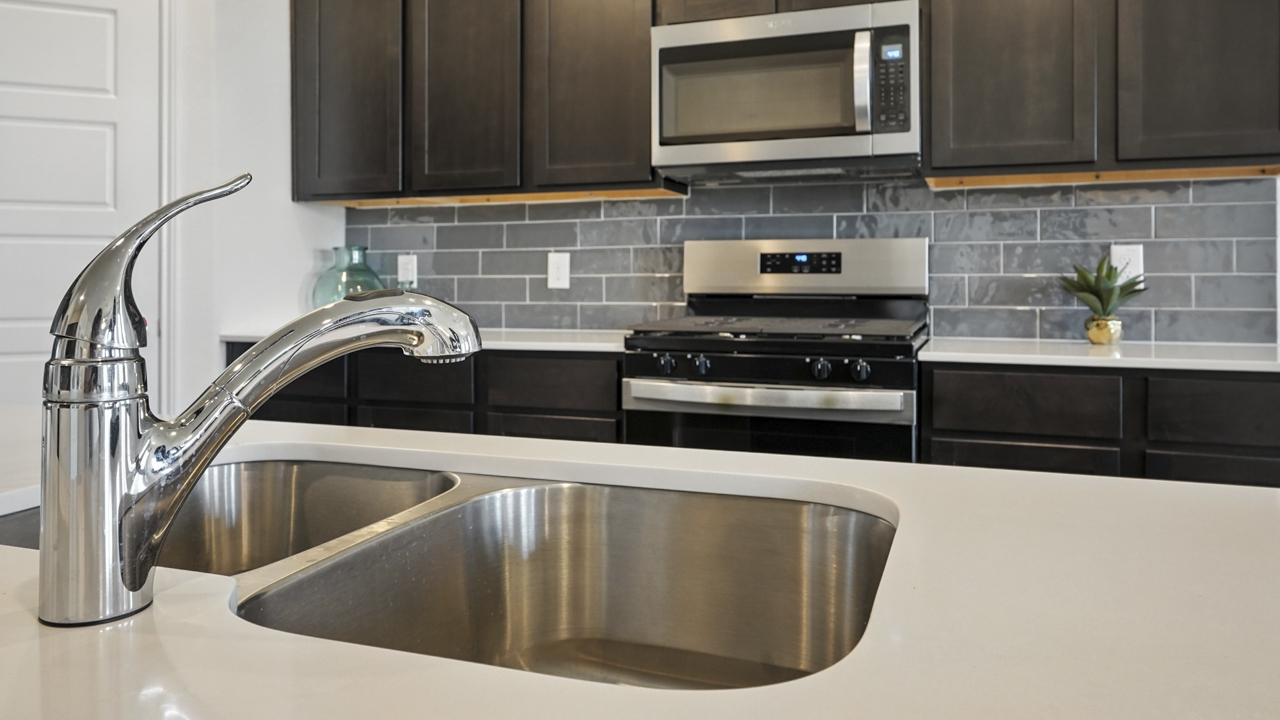Large kitchen with island and brown cabinets