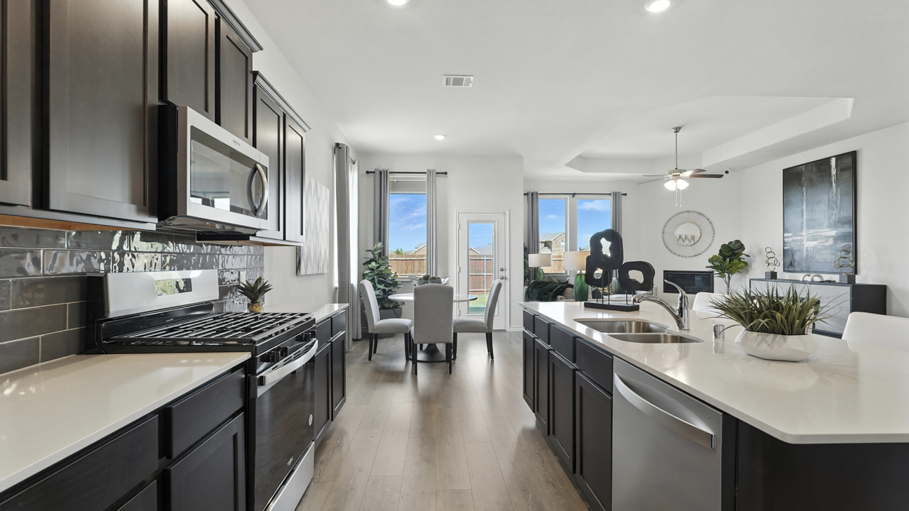 Large kitchen with island and brown cabinets