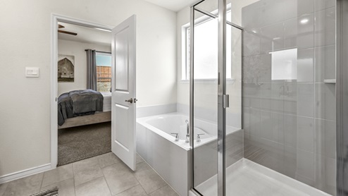 large walk in shower and oversized garden tub