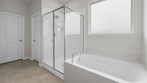 large walk in shower and oversized garden tub