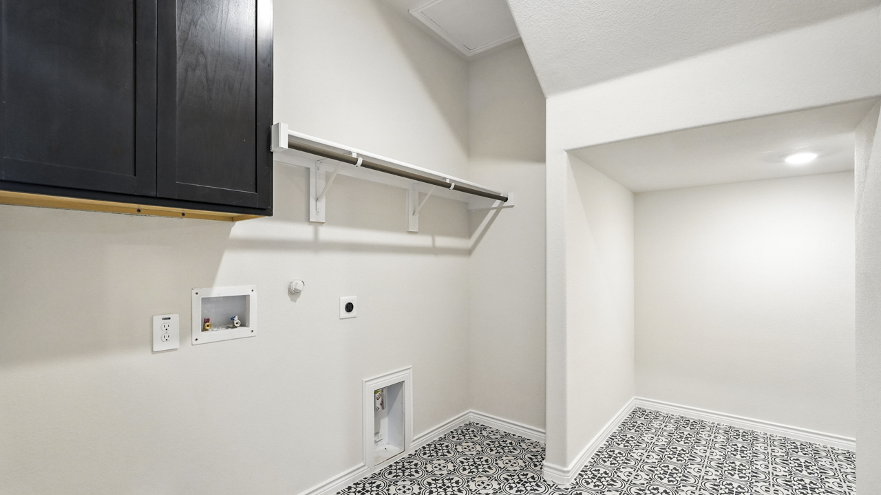 Utility area for washer and dryer