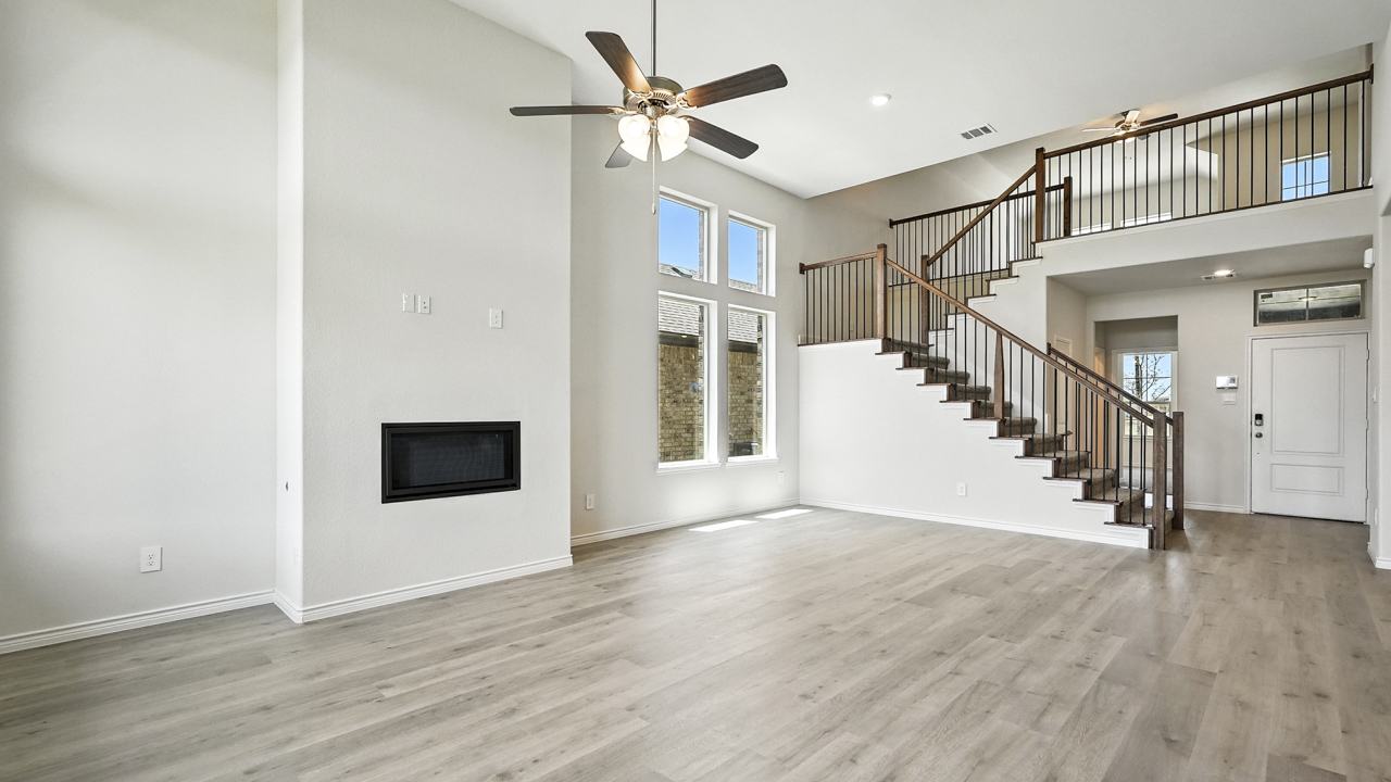 Large living room and windows next to kitchen