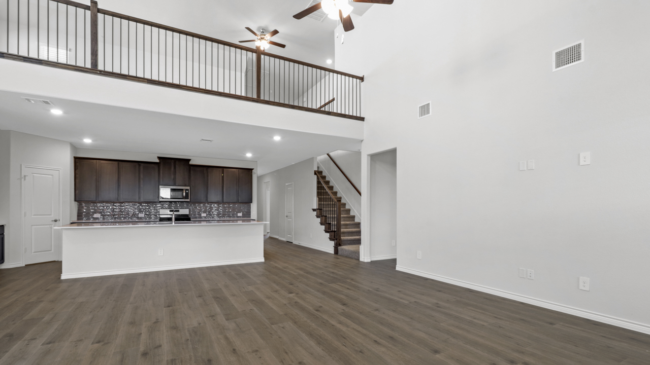 open entry way with view of a loft from the first floor