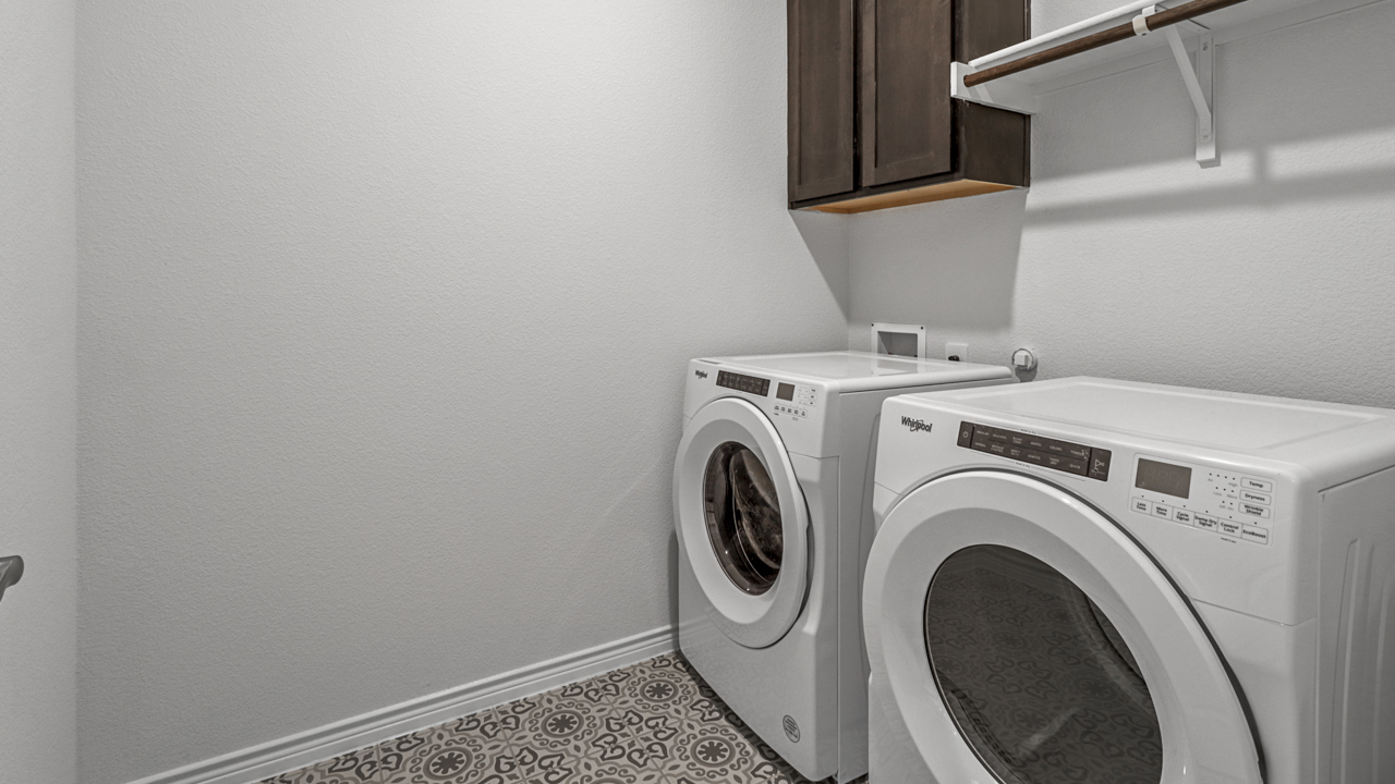 utility room with a washer and dryer