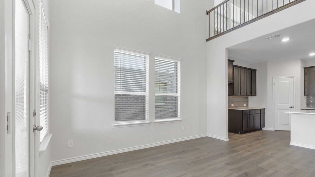 an open living space with high ceilings