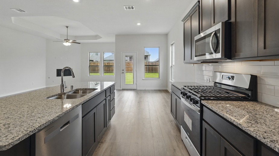 Kitchen with stainless steel appliances.