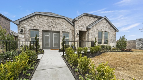 exterior with light colored brick exterior