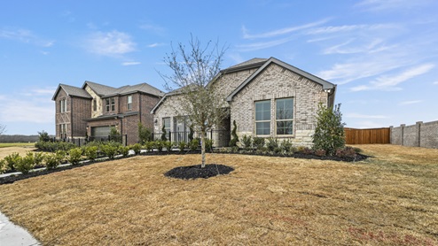 exterior with light colored brick exterior