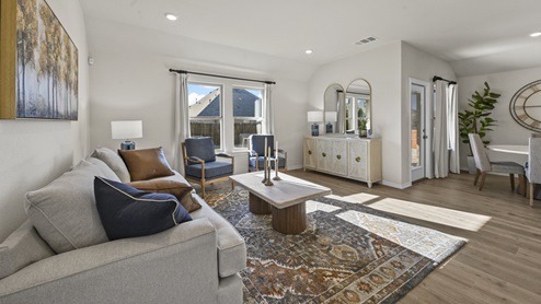 large living room with windows