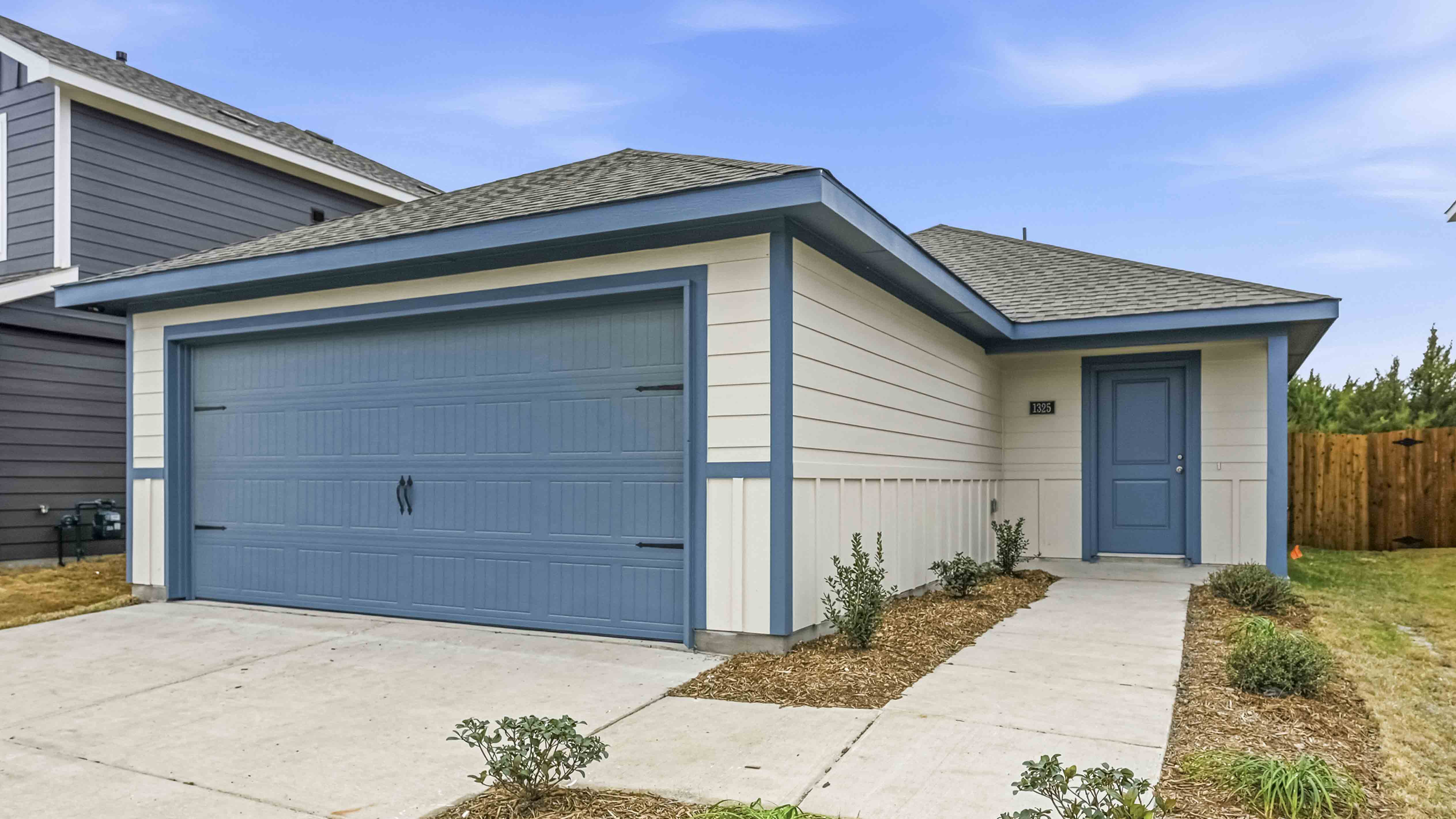 exterior of one story home with siding