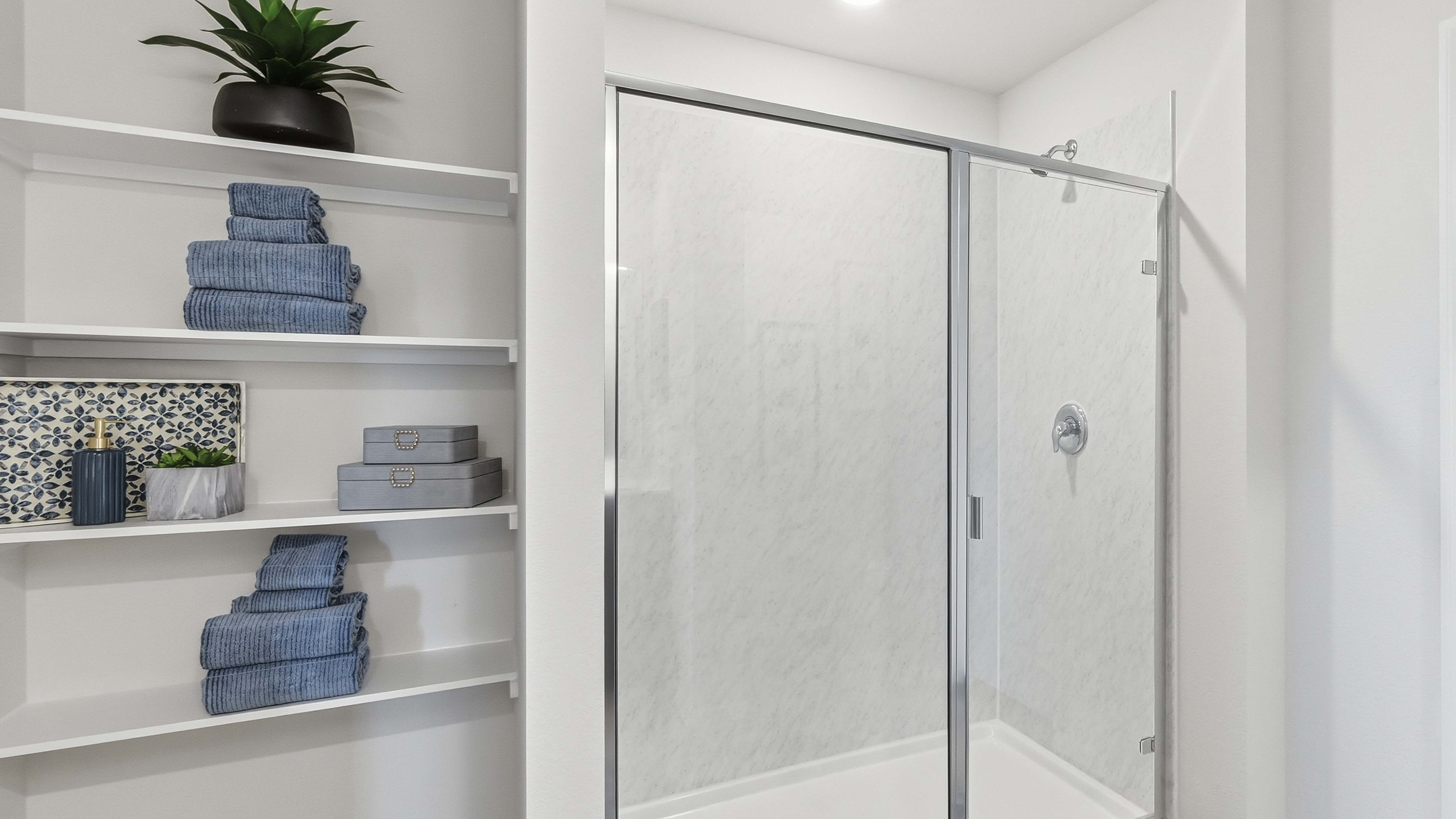primary bathroom with glass shower door