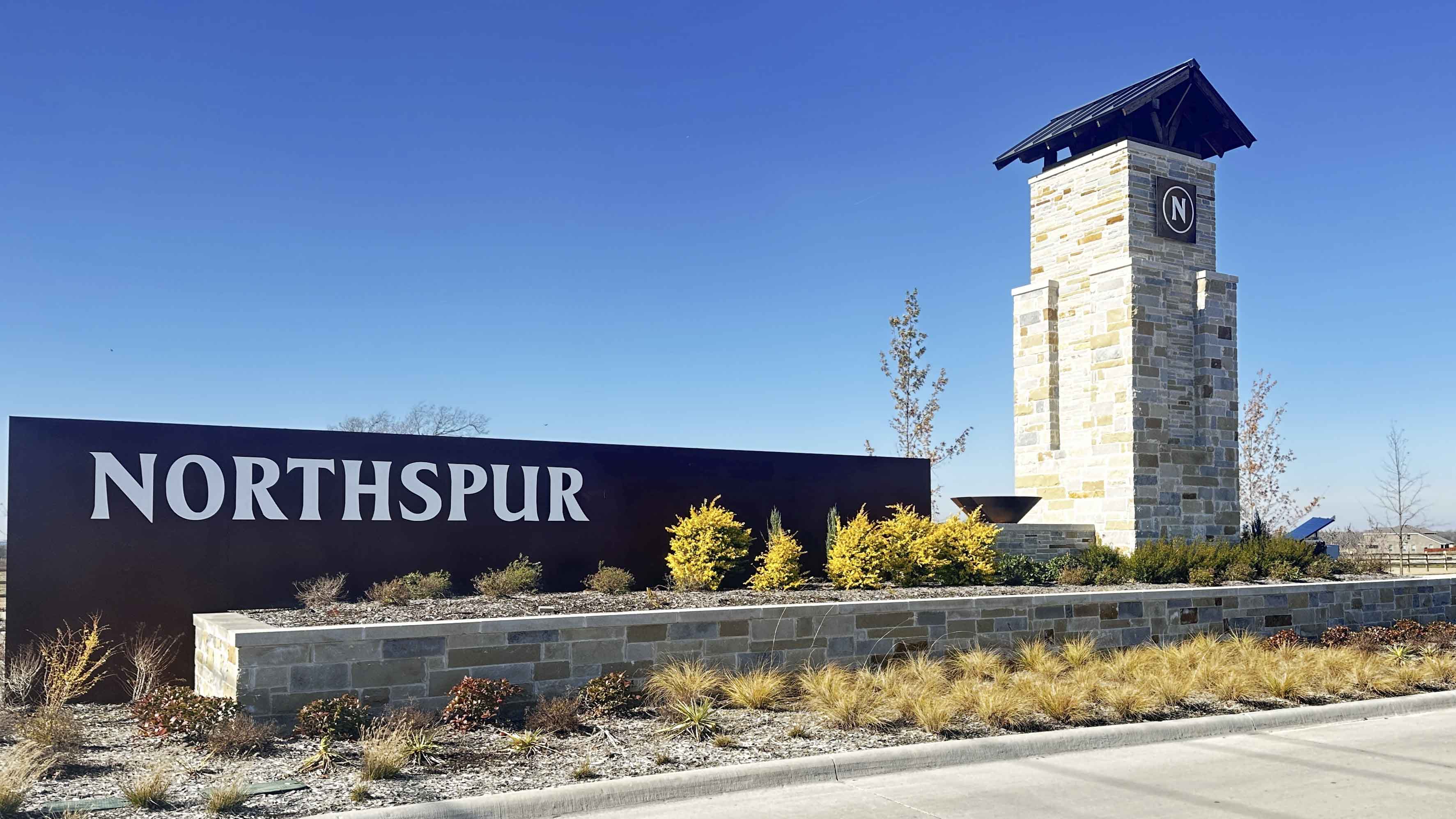 monument leading into the community