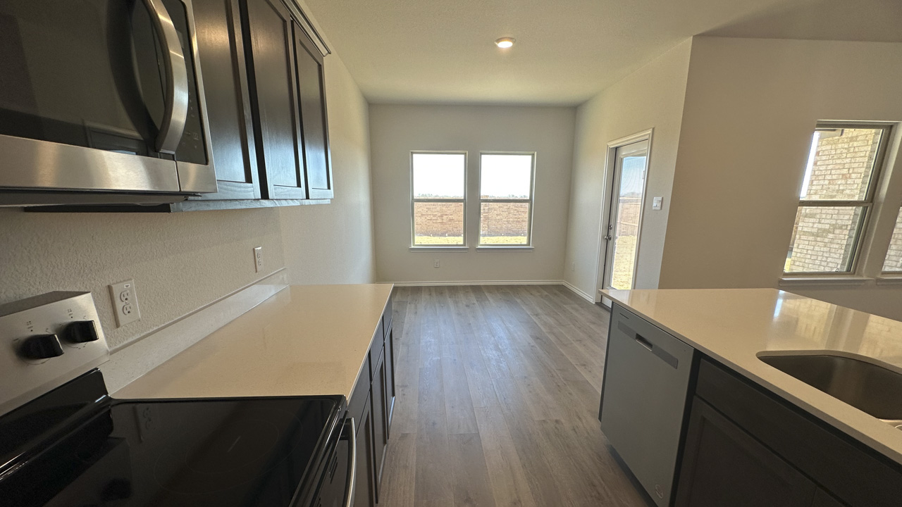 Kitchen with Island and Dining Area