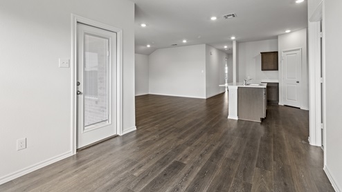 Breakfast nook and back door into kitchen