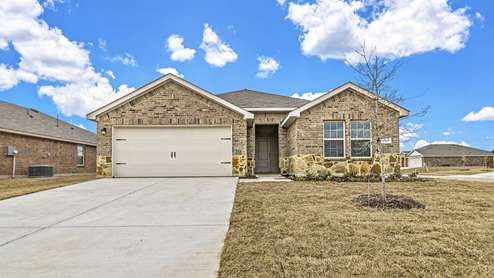Exterior single story home with long driveway
