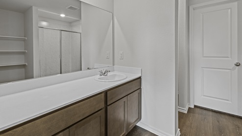 Primary bathroom with elongated vanity