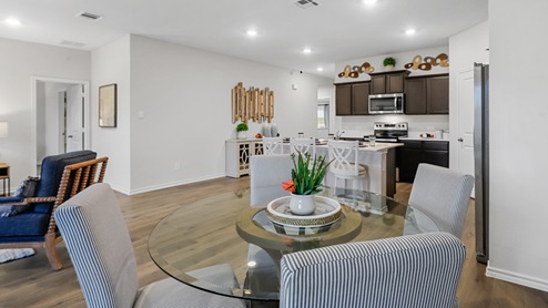 Breakfast nook table with views into kitchen