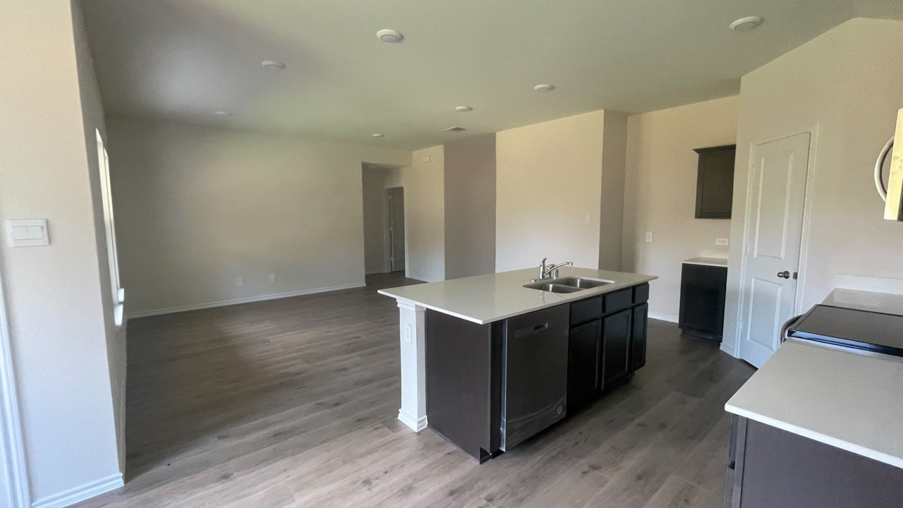 open concept kitchen and dining area