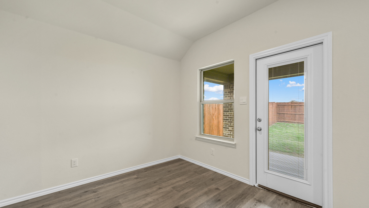 dining area leading to back door