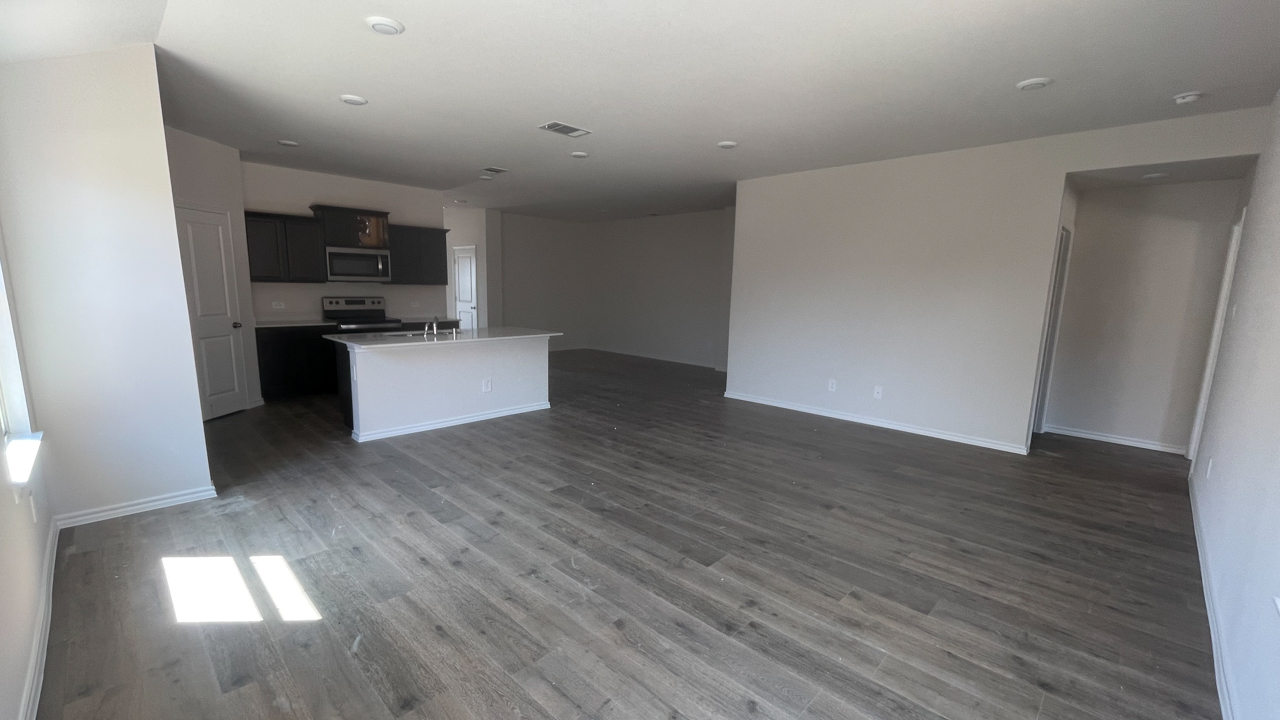 open concept living area with hardwood floors