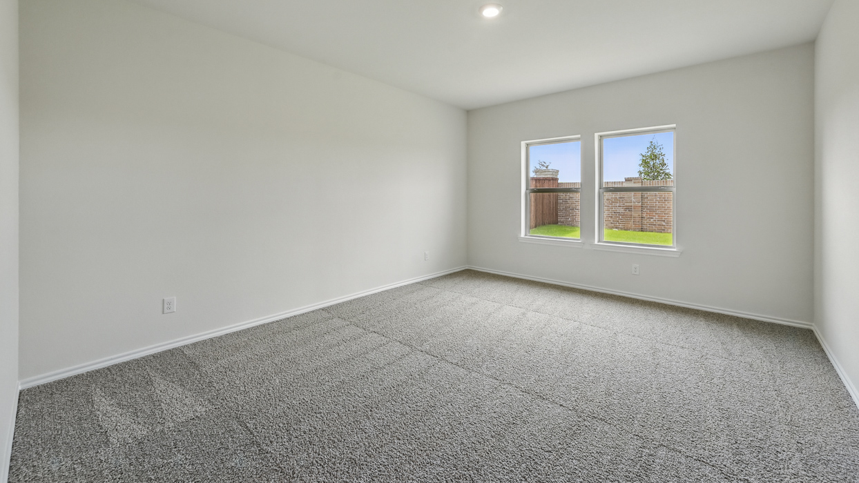 bedroom 3 with carpeted floors