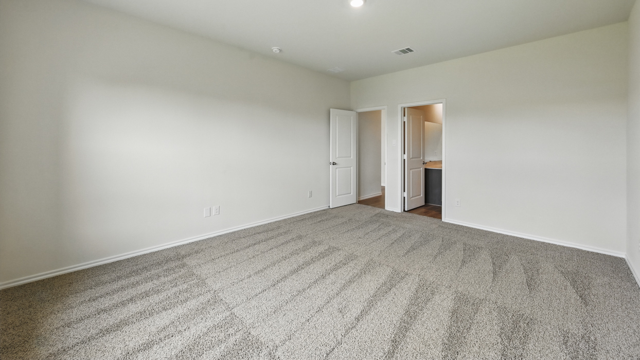 bedroom 3 with carpeted floors