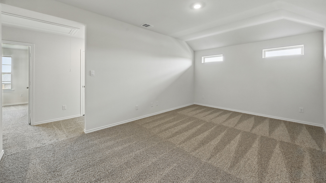 game room on second story with carpeted floors
