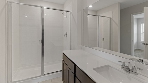 E40A primary bathroom with view of the shower