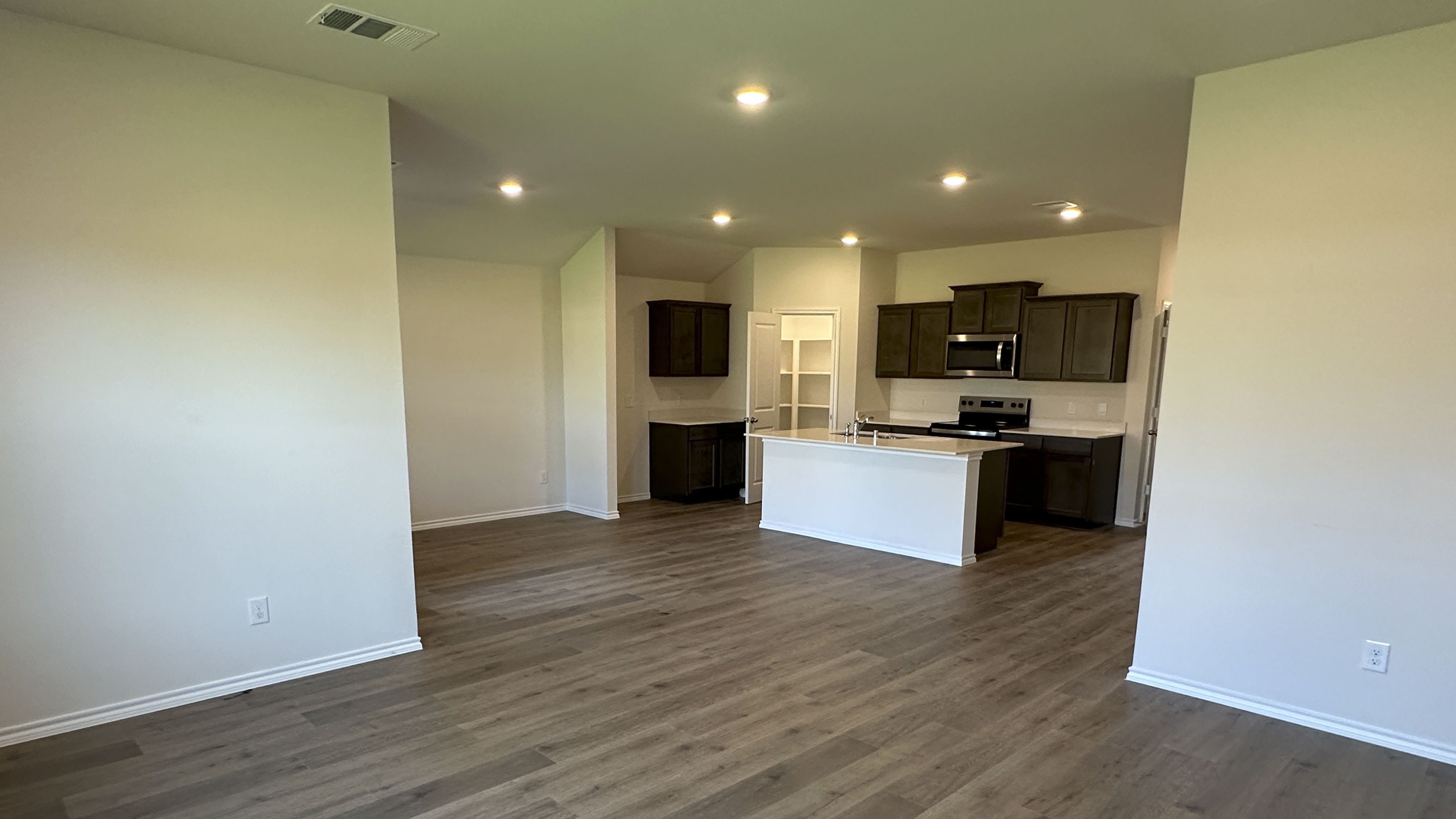 dining and living area with hardwood floors
