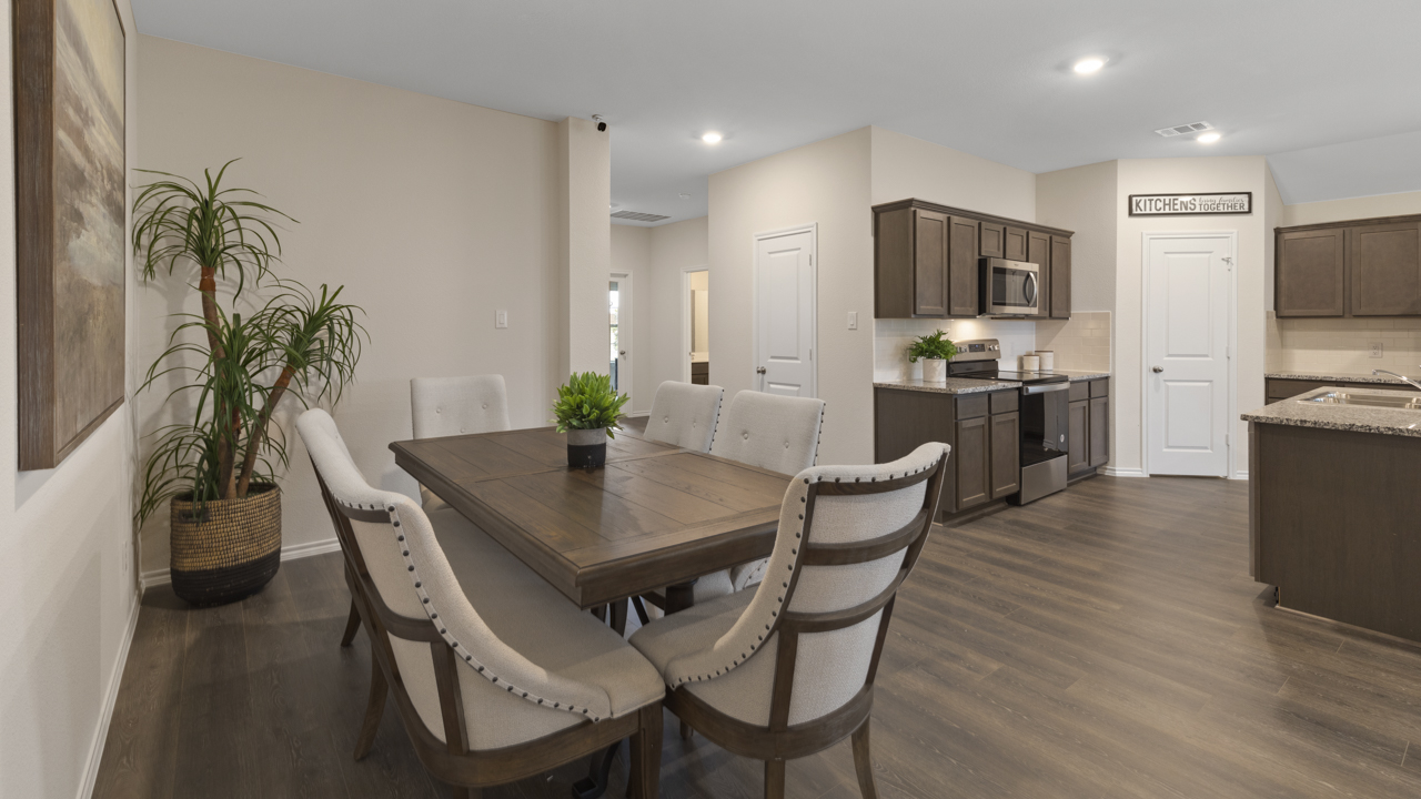 X40L dining area with view of interior entrance