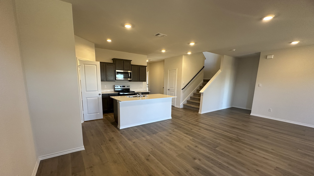 open concept living area with hardwood floors